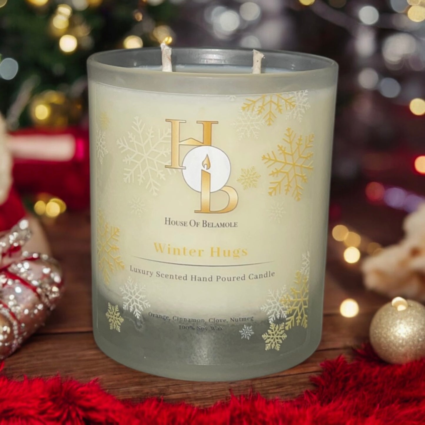 Unique Christmas Scented Soy Candle with snowflakes on a red blanket