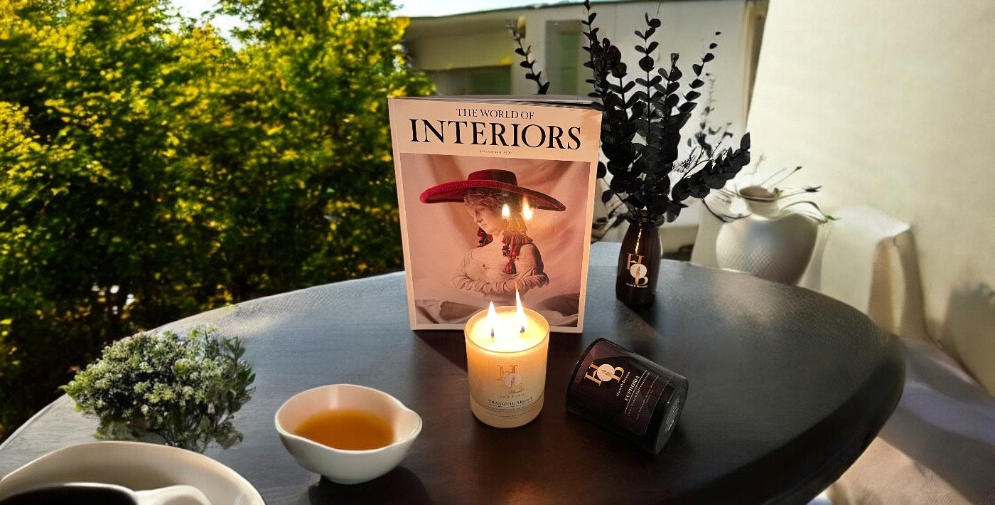 Two-wick scented soy candle styled on a luxury balcony, creating a calm and spa-like home fragrance scene.