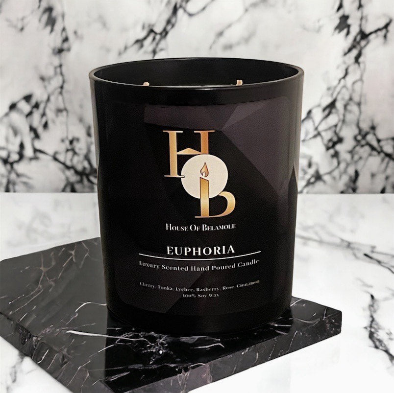 Fruity spicy scented soy candle styled in a luxury home interior to create a relaxing home fragrance experience with a touch of elegant decor.