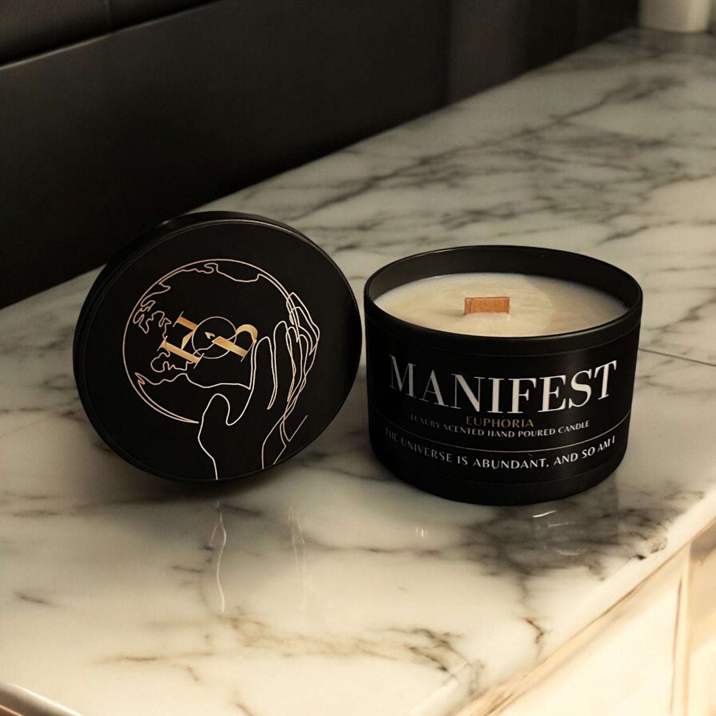 Euphoria manifestation candle with a warm glow and fruity spicy aroma, styled in a luxury home to enhance mood, well-being, and relaxing interior ambiance.