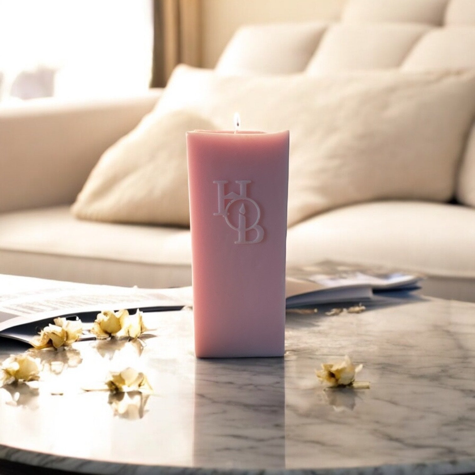 Statement sculptural soy pillar candle adding artistic character to luxury interior décor.