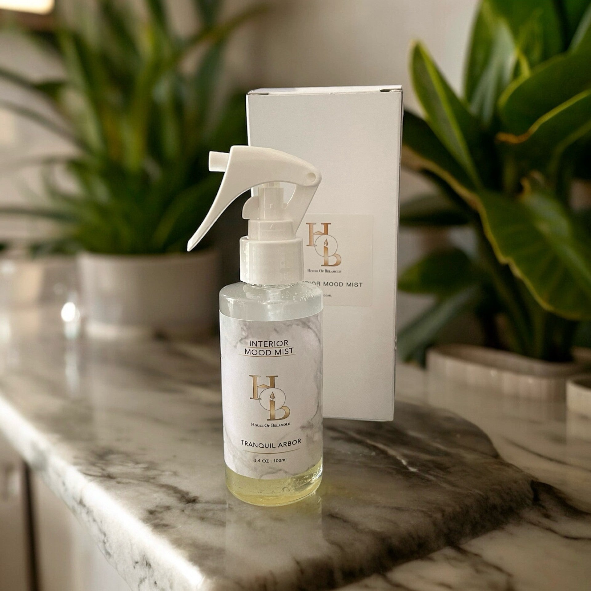 Tranquil Arbor room mist in luxury gift packaging with calming oudh and floral woody notes, ideal for alcohol-free home fragrance and sophisticated interior gifting.