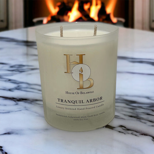 Tranquil Arbor scented soy candle with calming floral woody notes of oudh rose, sandalwood, and cedarwood, crafted for grounding home fragrance and elegant interior decor.