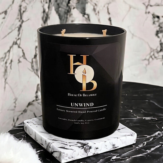 Unwind scented soy candle with calming floral woody notes of lavender and white woods, crafted for relaxing home fragrance and elegant interior styling.