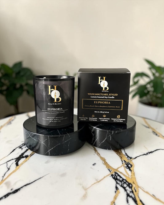 2-wick scented soy candle styled on a marble table in a modern home interior