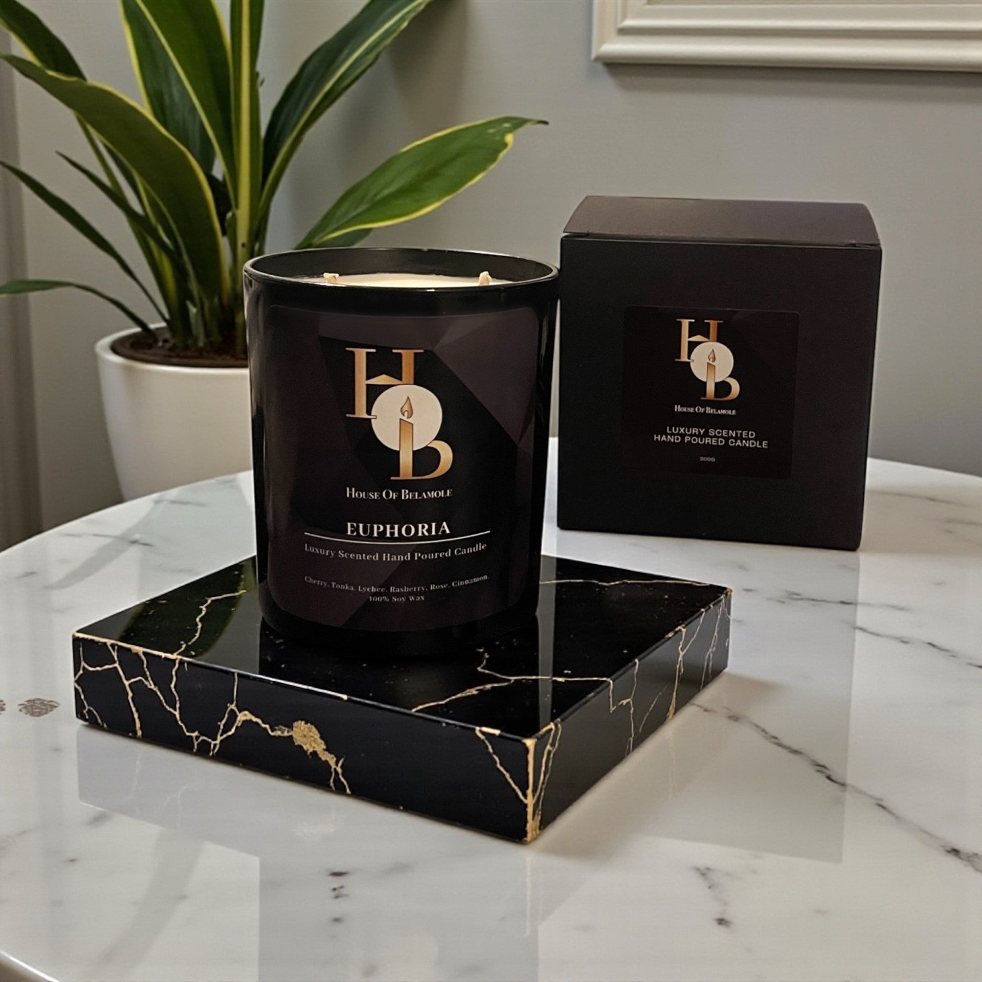 Fruity spicy scented soy candle styled in a luxury home interior to create a relaxing home fragrance experience with a touch of elegant decor.