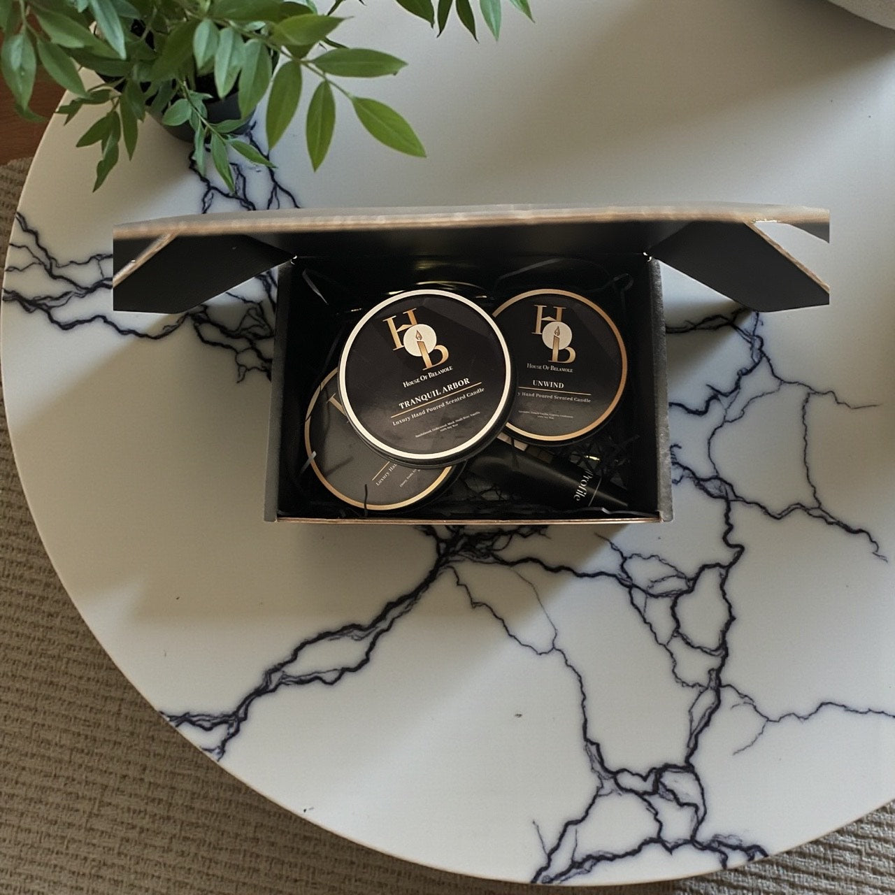 A Flame for Every Feeling mini candle gift set displayed in a luxury interior, highlighting a warm, relaxed and inviting cosy space.