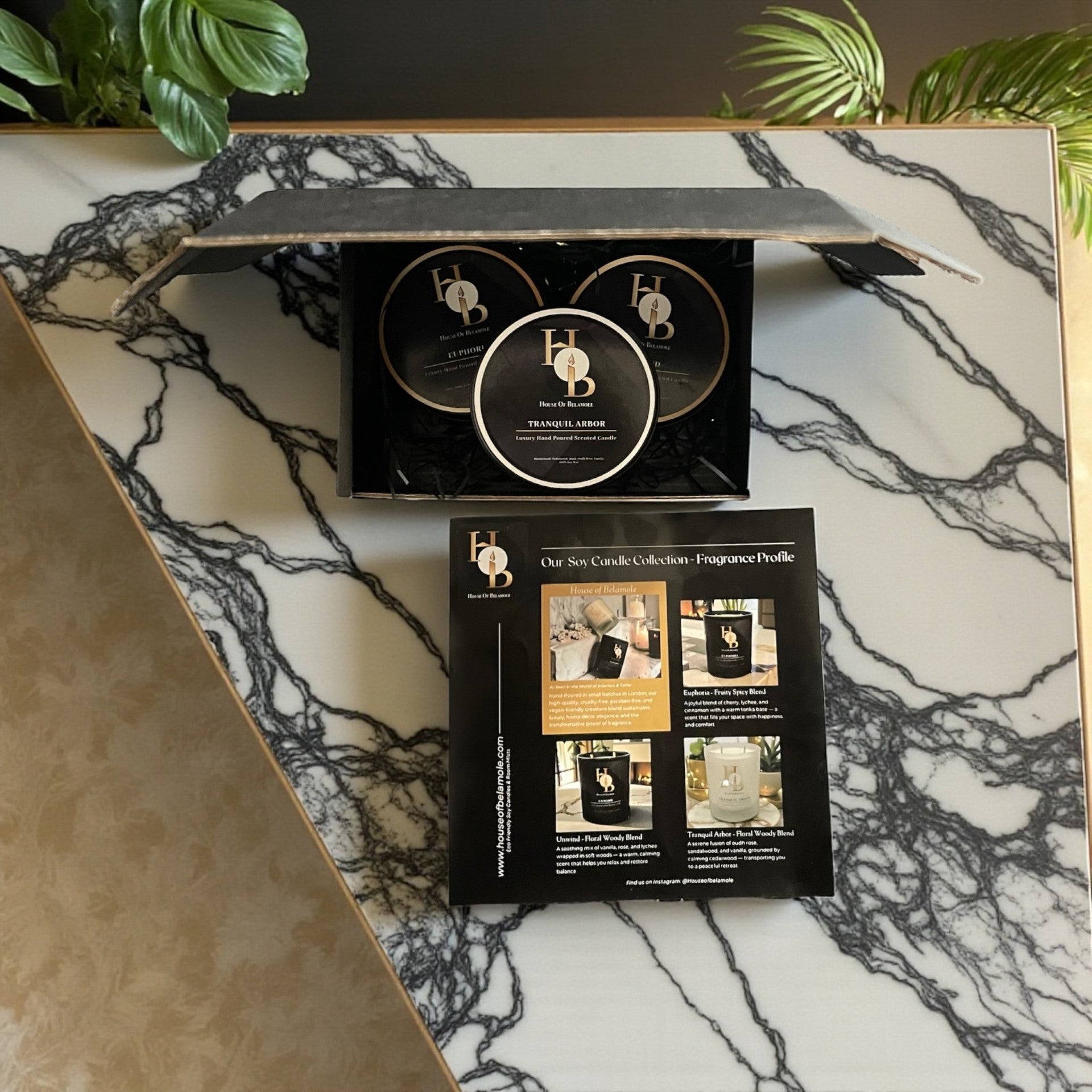 Mini scented soy candle gift set styled in a warm, luxurious hygge-inspired living space, creating a calm, cosy and mood-lifting atmosphere.