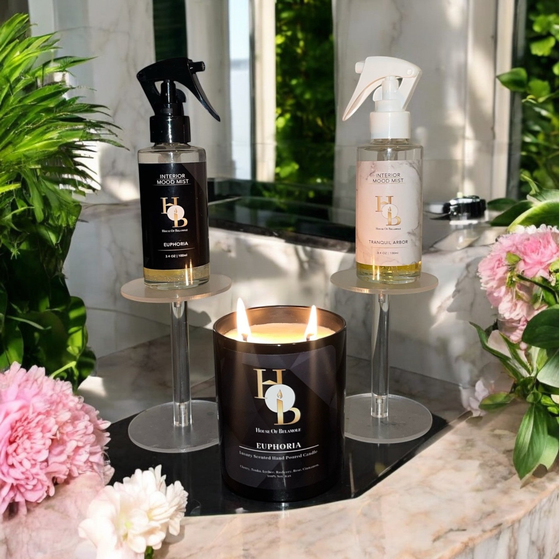 Room mists and soy candles styled in a cosy home interior to create a peaceful sanctuary, inspiring calm, relaxation, and well-being through natural home fragrance and elegant decor.
