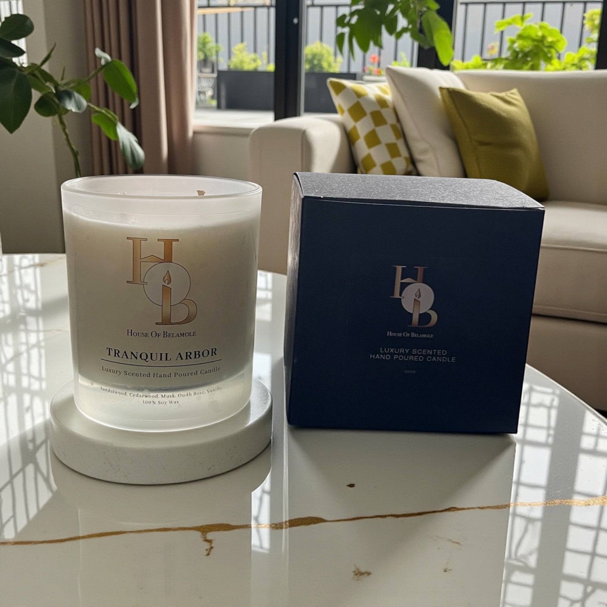 
Tranquil Arbor scented soy candle in luxury gift box with oudh rose, sandalwood, and vanilla notes — ideal for calming home fragrance and elegant interior gifting