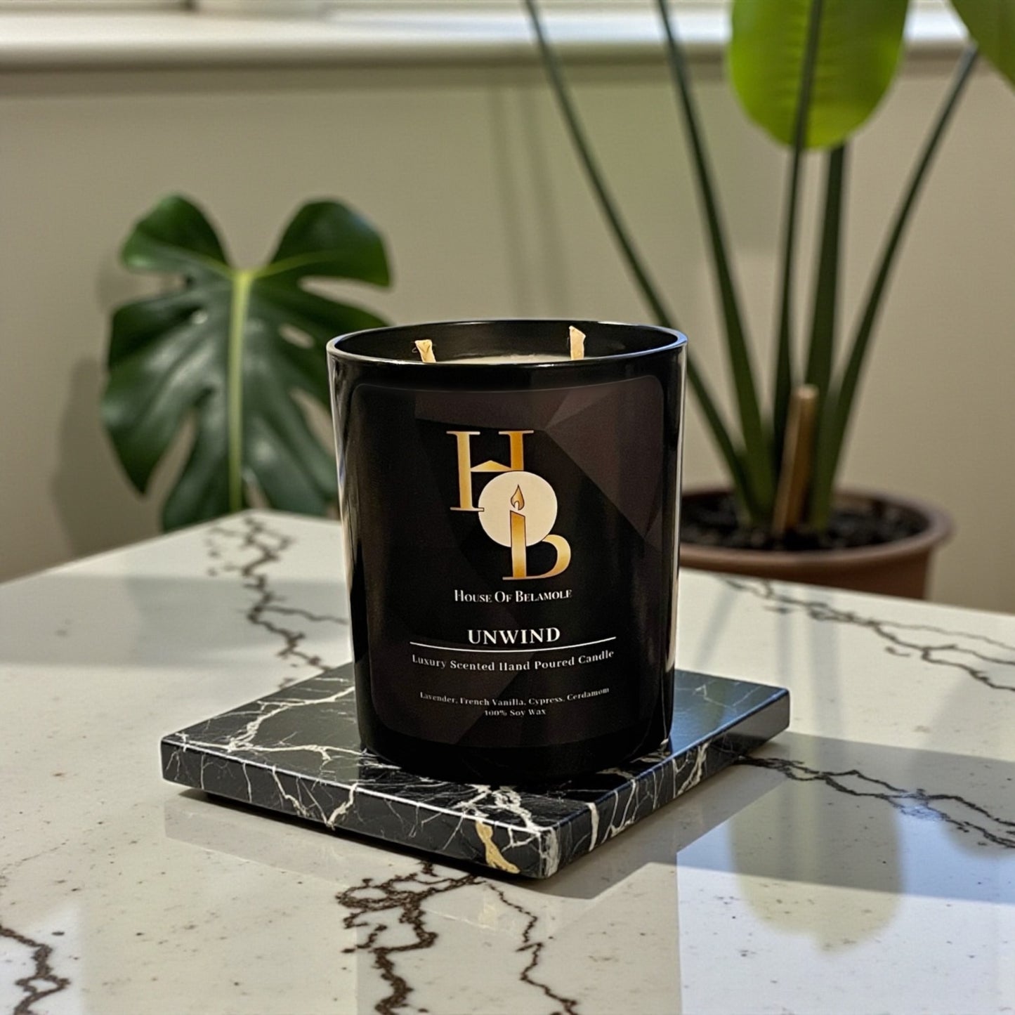 
Unwind soy candle styled in a luxury interior, delivering soothing home fragrance with floral and woody notes for stress relief and home decor.
