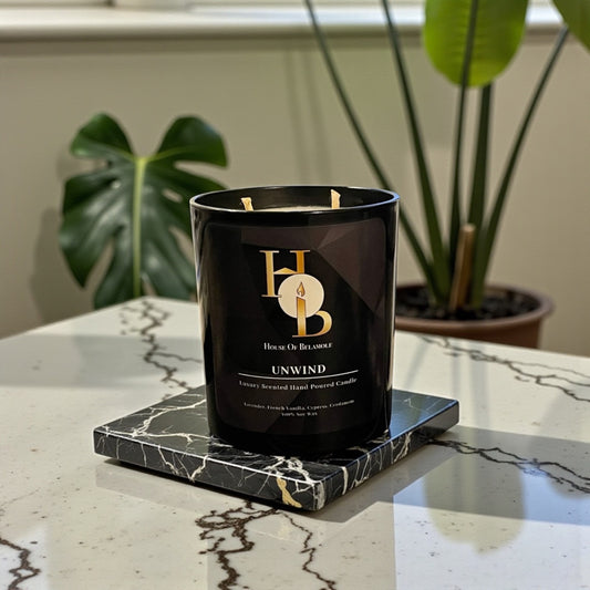 
Unwind soy candle styled in a luxury interior, delivering soothing home fragrance with floral and woody notes for stress relief and home decor.
